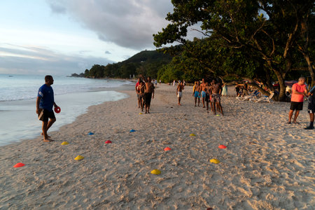 MAHE, SEYCHELLES - AUGUST 13 2019 - Local soccer team training on the beach. With a population of roughly 94,367, it has the smallest population of any sovereign African countryのeditorial素材