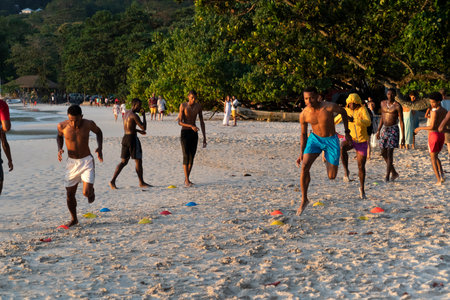 MAHE, SEYCHELLES - AUGUST 13 2019 - Local soccer team training on the beach. With a population of roughly 94,367, it has the smallest population of any sovereign African countryのeditorial素材