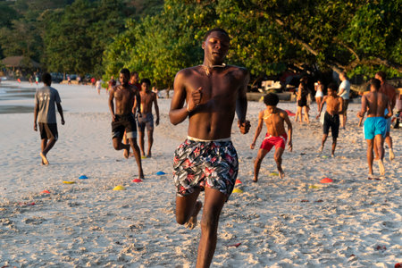 MAHE, SEYCHELLES - AUGUST 13 2019 - Local soccer team training on the beach. With a population of roughly 94,367, it has the smallest population of any sovereign African countryのeditorial素材