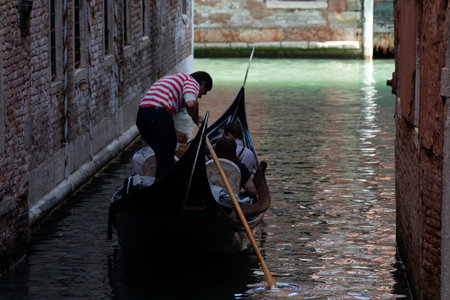 VENICE, ITALY - SEPTEMBER 15 2019 - Venice is one of the most visited town in the world. Most of the tourist take the romantic gondola tourのeditorial素材