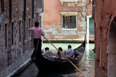 VENICE, ITALY - SEPTEMBER 15 2019 - Venice is one of the most visited town in the world. Most of the tourist take the romantic gondola tourのeditorial素材