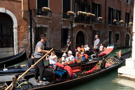 VENICE, ITALY - SEPTEMBER 15 2019 - Venice is one of the most visited town in the world. Most of the tourist take the romantic gondola tourのeditorial素材