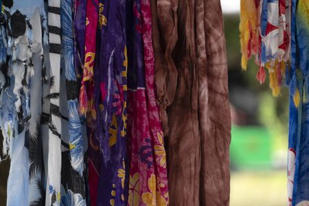 Batik indonesian silk cotton fabric tissue for sale on display at the marketの写真素材