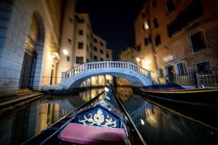 Venice Gondola channels tour at nightの写真素材