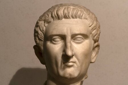 ancient roman head marble sculpture isolated on black background
