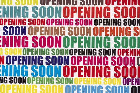 Opening soon multi color sign on white