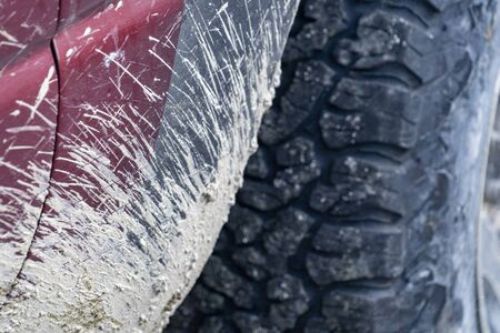 4x4 offroad driving in baja california desert detail of mud and car