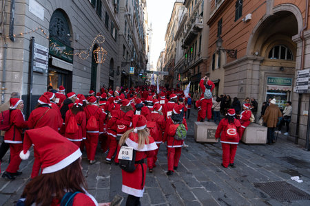 GENOA, ITALY - DECEMBER 22 2019 - Traditional Santa claus walk more than 2,000 people christmas dressed walking in town centerのeditorial素材