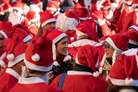 GENOA, ITALY - DECEMBER 22 2019 - Traditional Santa claus walk more than 2,000 people christmas dressed walking in town centerのeditorial素材