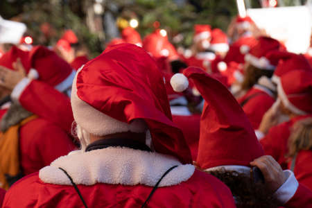 GENOA, ITALY - DECEMBER 22 2019 - Traditional Santa claus walk more than 2,000 people christmas dressed walking in town centerのeditorial素材
