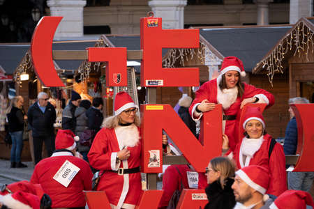 GENOA, ITALY - DECEMBER 22 2019 - Traditional Santa claus walk more than 2,000 people christmas dressed walking in town centerのeditorial素材