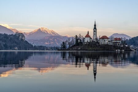 Bled lake panorama at sunset in winter seasonの写真素材