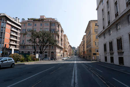 GENOA, ITALY - APRIL 5 2020 - Downtown streets are desert due to coronavirus covid19 quarentine people must stay home to avoid infection spreadingのeditorial素材