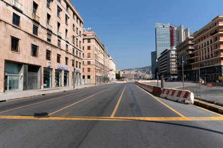 GENOA, ITALY - APRIL 5 2020 - Downtown streets are desert due to coronavirus covid19 quarentine people must stay home to avoid infection spreadingのeditorial素材
