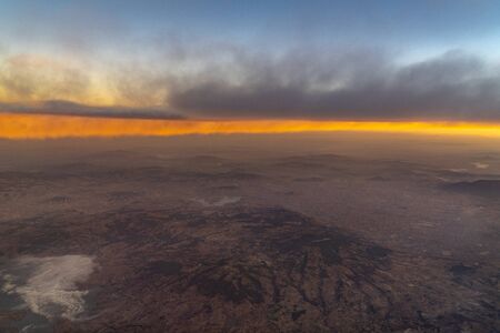 mexico city aerial view at sunrise panorama frm airplane