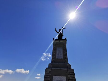 Christ statue on Giarolo Mountain top Italyの写真素材