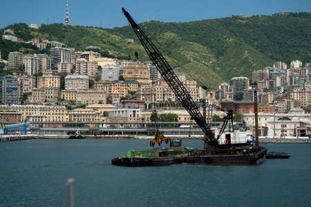 Harbor port dredge working on sea detailの写真素材