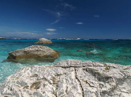 Seagull bay baia dei gabbiani beach sardinia view panorama crystal blue watersの写真素材