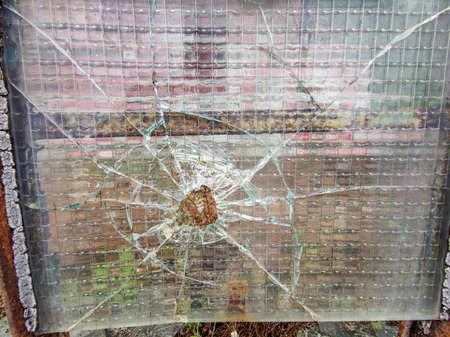 real gun bullet broken window glass