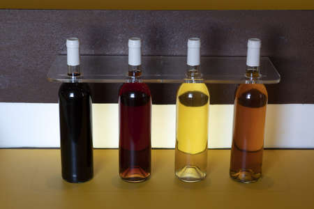 Different bottles of Azores wine red, rose, orange, white detailの写真素材