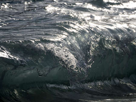 Sea wave on the shore detail