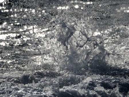Sea wave on the shore detail