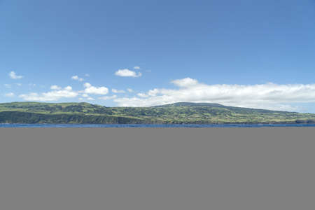 faial island azores cliff view from the sea landscapeの写真素材