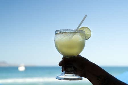 tequila sunrise glass in a beach bar in baja california sur