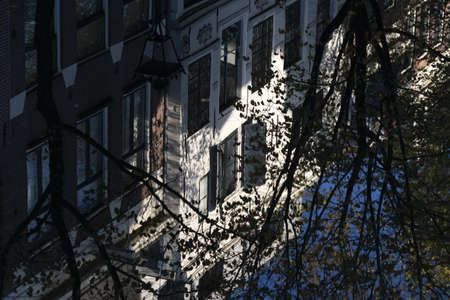Amsterdam canal view reflection at sunrise panorama