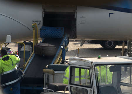 luggage loading on airplane detail