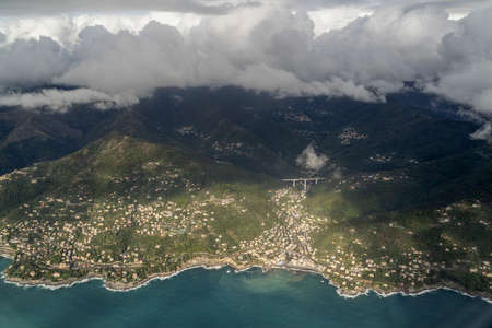 Recco village genoa aerial view before landing on cloudy day panoramaの写真素材
