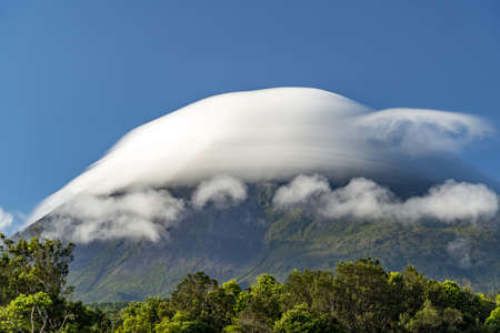 pico island azores volcano covered by soft clouds view panoramaの写真素材
