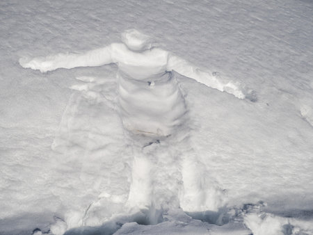 Human shape in the snow detailの写真素材