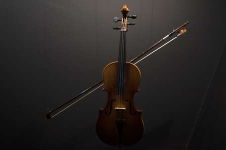 violin isolated on black with bow