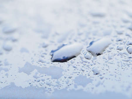 rain drops on blue metal close up macro detailの写真素材