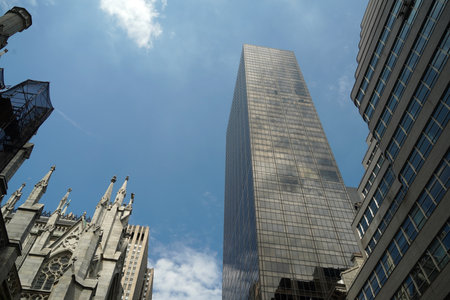 new york city skycrapers from street view on sunny day