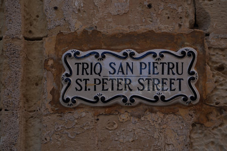 Malta Medina medieval village stone building street signの写真素材