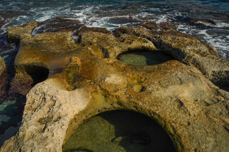 saint peter pools Malta rock formation hole on rocks viewの写真素材