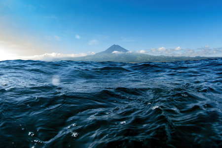 pico volcano view from ocean water while swimmingの写真素材