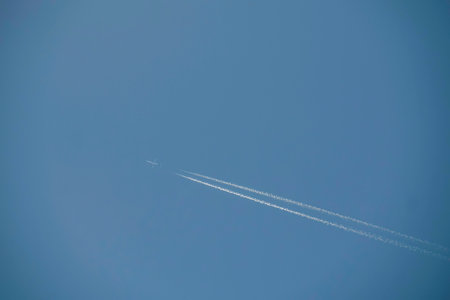 jet tracks in blue sky far