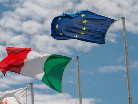 EU and italian flags on The Puez mountain in dolomites badia valley panorama landscapeの写真素材