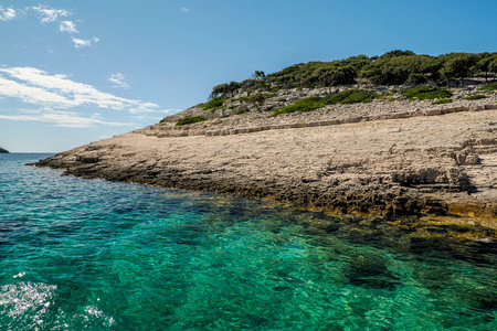 turquoise water paradise lagoon in Archipelago - Islands of the Kornati archipelago national park in Croatia landscape view from the sea boatの写真素材