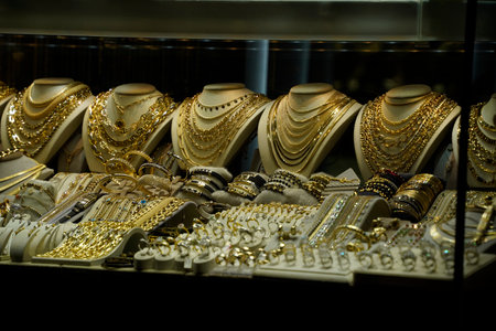 A gold shop windows at Istanbul Grand Bazar or Kapali Carsi, Turkey. Jewelry in the store window. A lot of luxury jewelry in the oriental market. Concept of shopping in the Middle East.の写真素材