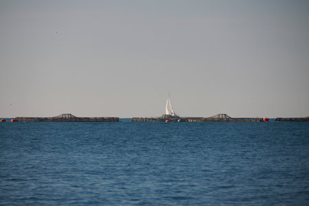 Small fish farm in Ligurian Mediterranean breeding sea bream at sea