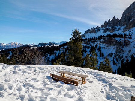 The Alpine Pass Passo delle Erbe Sass de Putia at the entrance to the Puez-Odle Nature Reserve. dolomites snow panorama in winterの写真素材