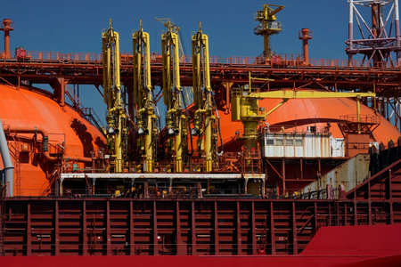 A regasifier ship LNG Liquified Natural Gas tanker anchored in Genoa Harbor, Italy