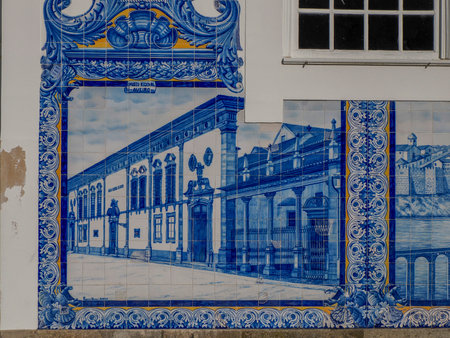 The Aveiro Railway station is Historic building ornamented with many typical blue Azulejos panels of Factory Fabrica da Fonte Nova displaying regional motifs. Portugal.の写真素材