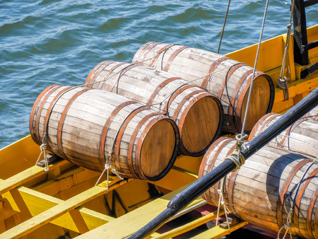 boat with wine barrels ribeira Porto old town street view building, portugal. on the Douro Riverの写真素材