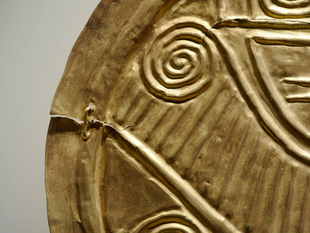 BOGOTA, COLOMBIA - JULY 3, 2024: Superb Gold artifacts on display in the Museo del Oro (Gold Museum). Isolated on backgroundのeditorial素材
