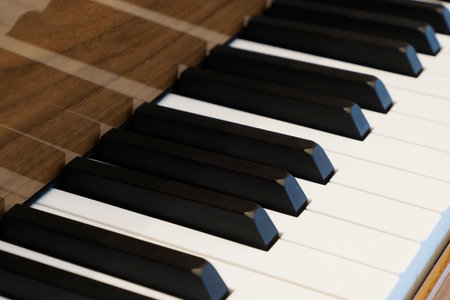 An acoustic grand piano keyboard detail close upの写真素材